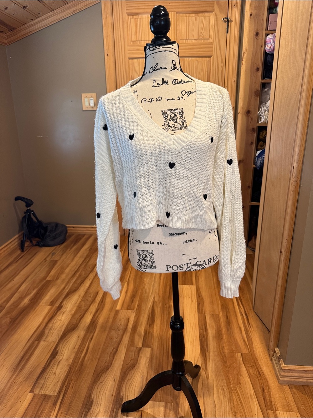 Amazon Cream V-Neck Sweater with Black Heart Motifs